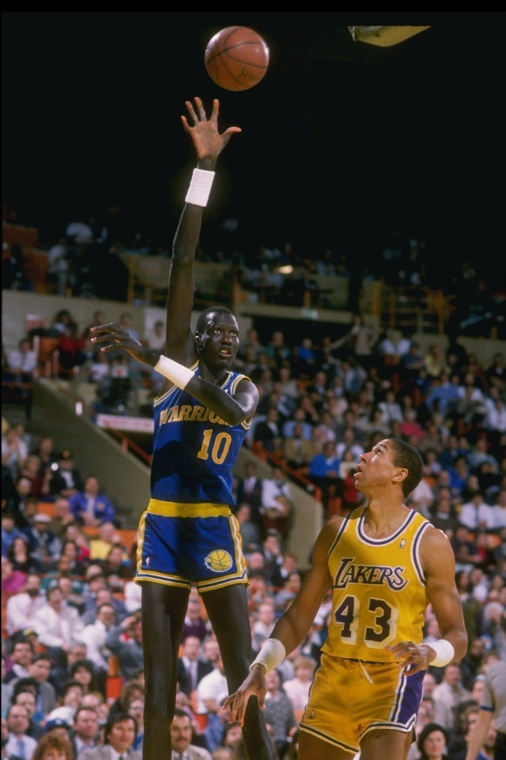 Muggsy Bogues e Manute Bol BOL Fotos