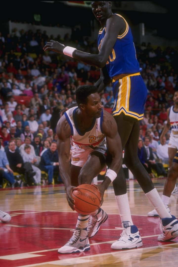 Muggsy Bogues e Manute Bol BOL Fotos