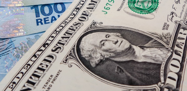 Dólar, conta de luz e até a crise ajudaram a conter a inflação, diz IBGE - UOL