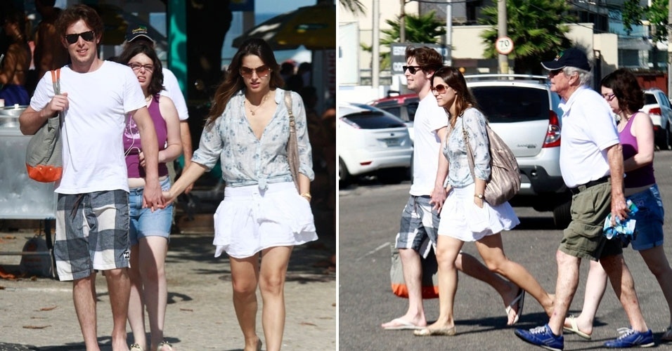 A atriz Fernanda Machado aproveita a tarde ensolarada de sábado para caminhar com o namorado na orla da Barra da Tijuca, no Rio de Janeiro (31/3/12)