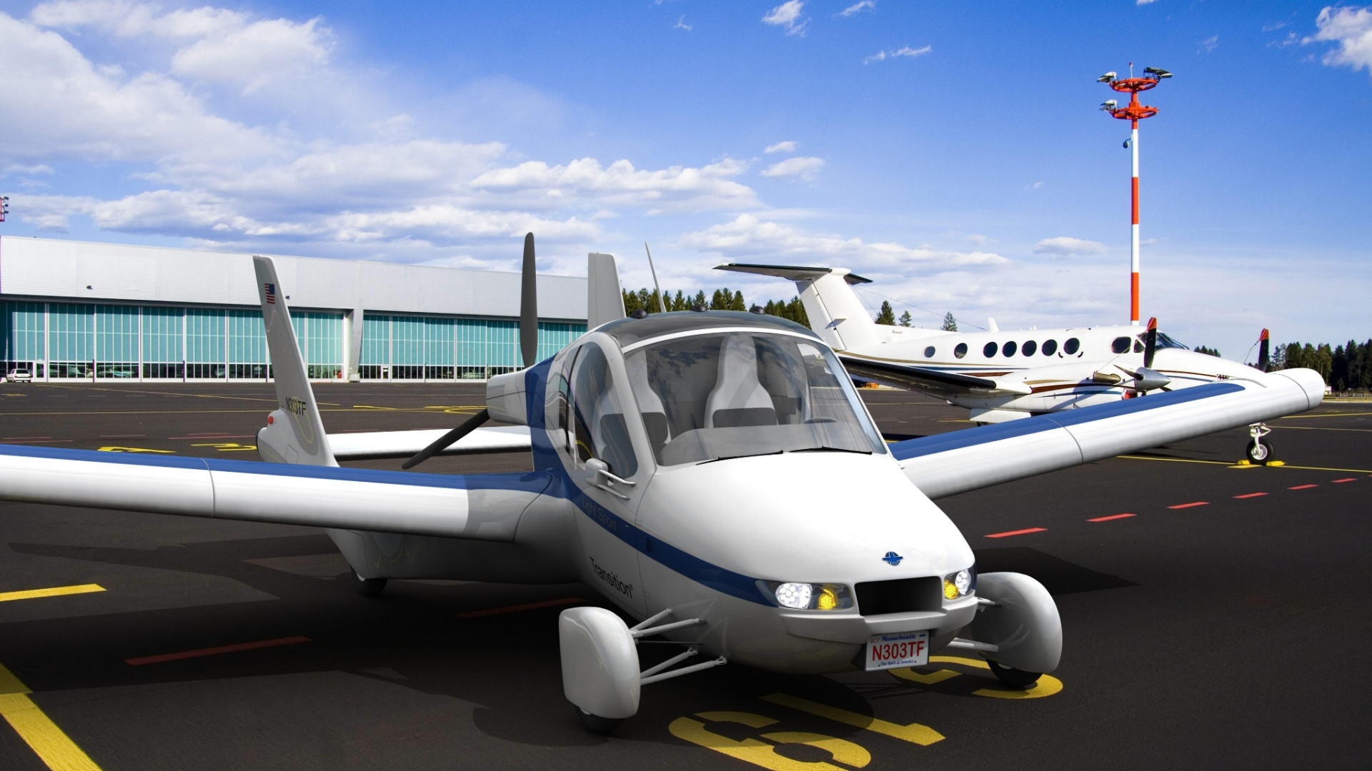 O Transition é um carro que pode transitar por qualquer estrada e, em menos de um minuto, é capaz de desdobrar suas duas asas, localizadas nas portas laterais, e se transformar num pequeno avião, que voa a uma altura de até 427 metros. O veículo, da Terrafugia, custará US$ 279 mil (cerca de R$ 509 mil) e a previsão é de começar a ser entregue no final deste ano - Divulgação Terrafugia/Efe