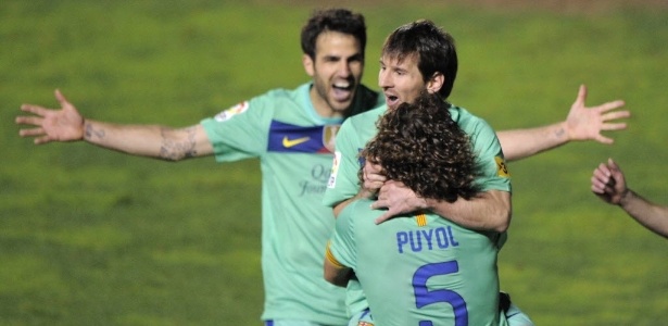 Messi comemora seu 2º gol na vitória de virada do Barcelona sobre o Levante - AFP PHOTO/ JOSE JORDAN