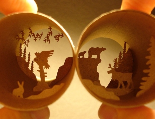 A ilustradora e artista plástica francesa Anastassia Elias cria cenários em miniatura com recortes colados dentro de rolos de papel. Acima, uma cena de vida selvagem - Anastassia Elias