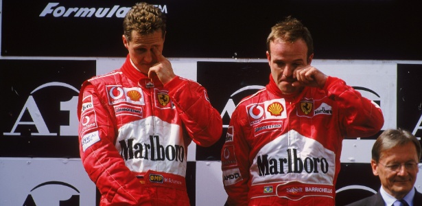 Barrichello e Schumacher no pódio em prova na Áustria, em 2002 - Tom Shaw/Getty Images