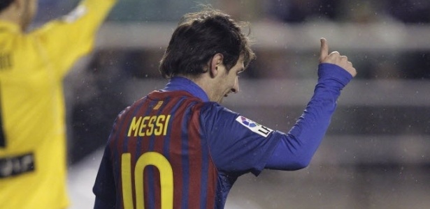 Messi comemora discretamente um de seus 73 gols na temporada 2011/12 - Víctor Lerena/Efe