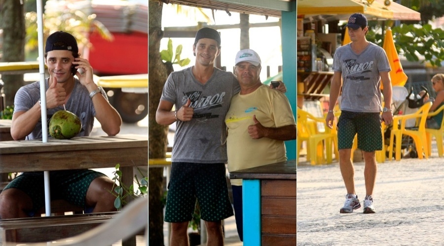 Ex-BBB Fael toma água de coco e caminha pela orla da praia, na zona oeste do Rio (10/5/12)