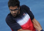 Em dia de Chuck Norris, Tipsarevic bate Djokovic no saibro azul de Madri - PEDRO ARMESTRE/AFP