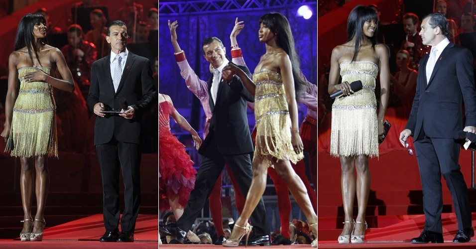 Naomi Campbell e o ator espanhol Antonio Banderas participaram de um evento beneficente em Viena, Áustria, e a modelo passou por alguns apuros com seu vestido, que insistiu em cair (19/5/12)