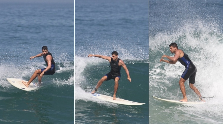 Cauã Reymond surfa em praia da zona oeste do Rio (28/5/12)