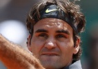 No embalo da torcida francesa, Federer vence romeno e soma 51 triunfos em Roland Garros - AFP PHOTO / KENZO TRIBOUILLARD