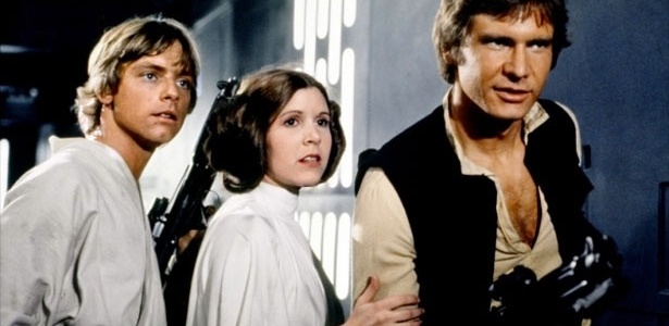 Luke Skywalker (Mark Hammil), Princesa Leia (Carrie Fisher) e Han Solo (Harrison Ford) em "Star Wars" - Divulgação