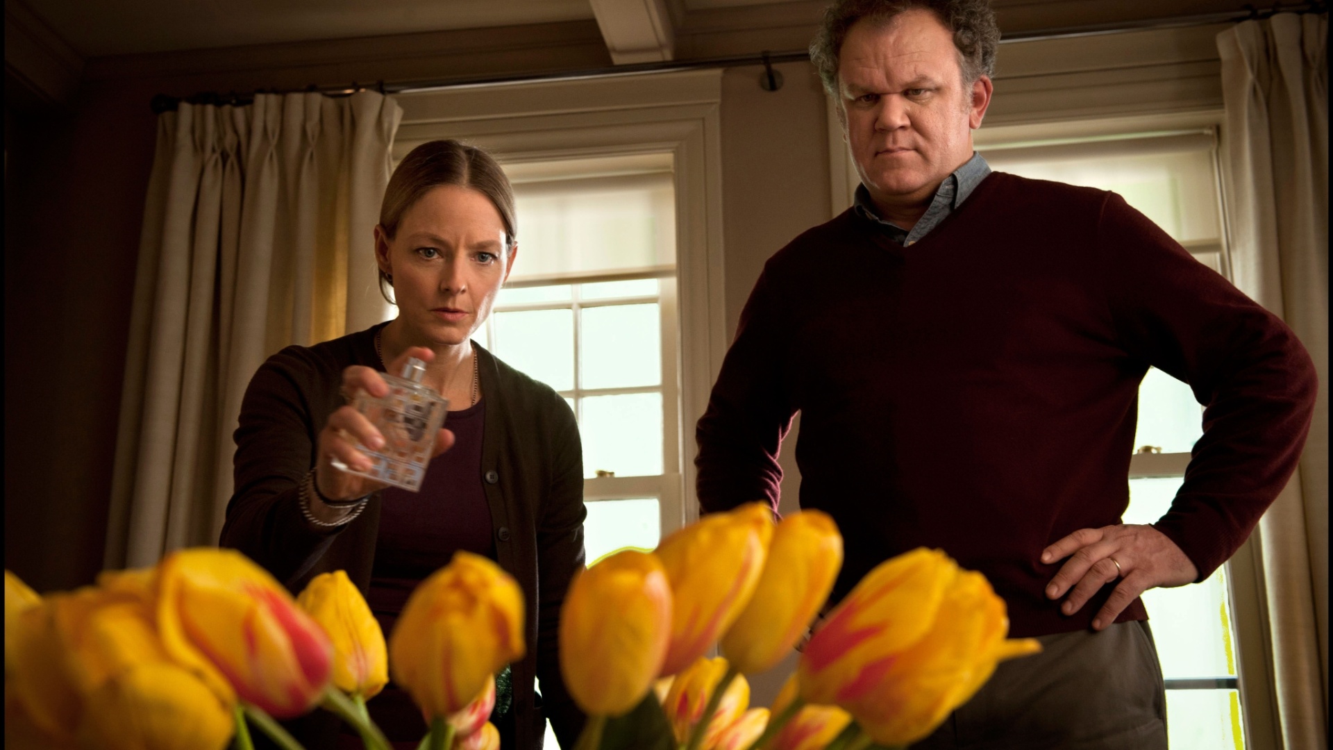 Jodie Foster e John C. Reily em cena de "Deus da Carnificina", de Roman Polanski - Divulgação