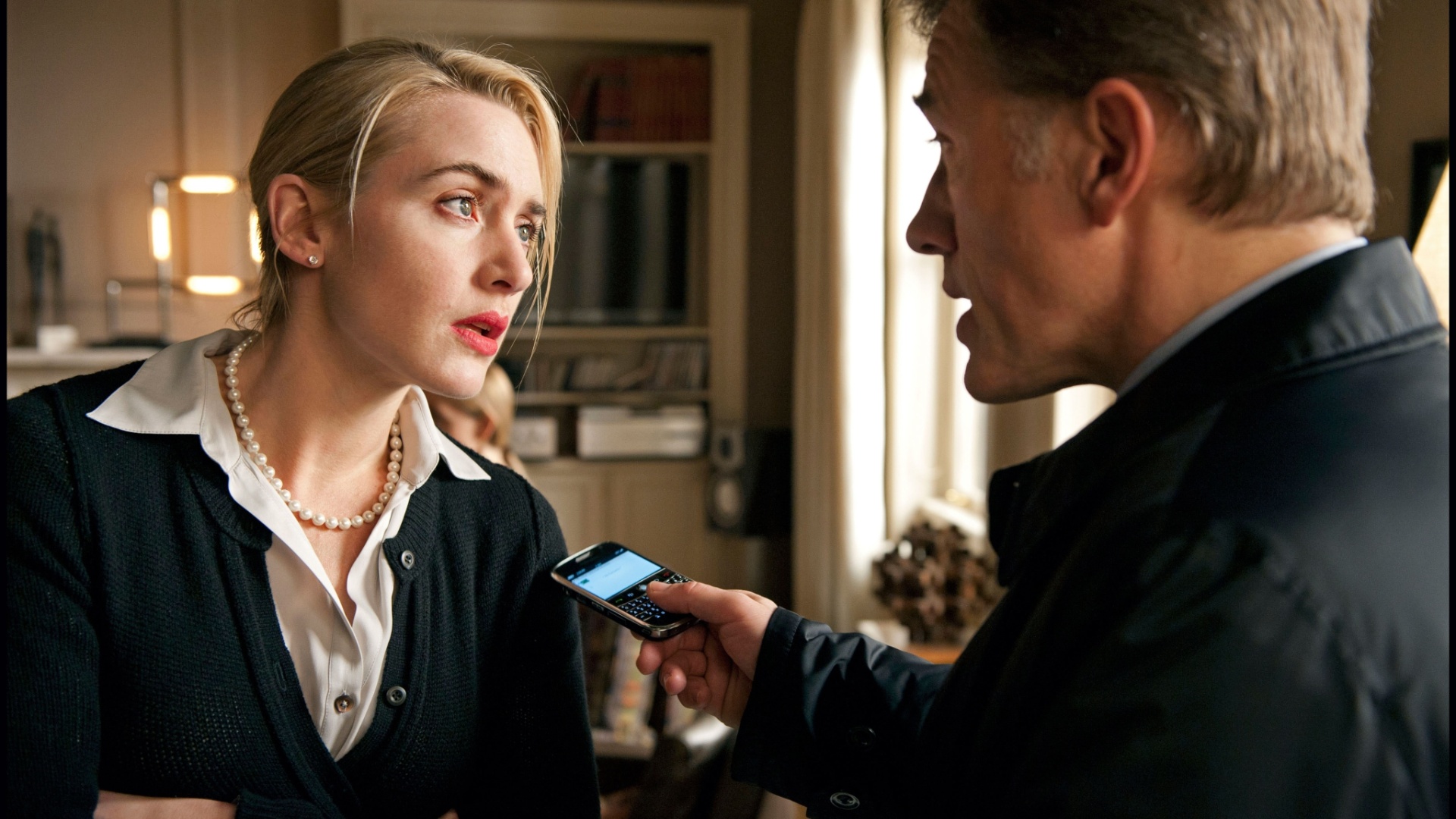 Kate Winslet e Christoph Waltz em cena de "Deus da Carnificina", de Roman Polanski - Divulgação