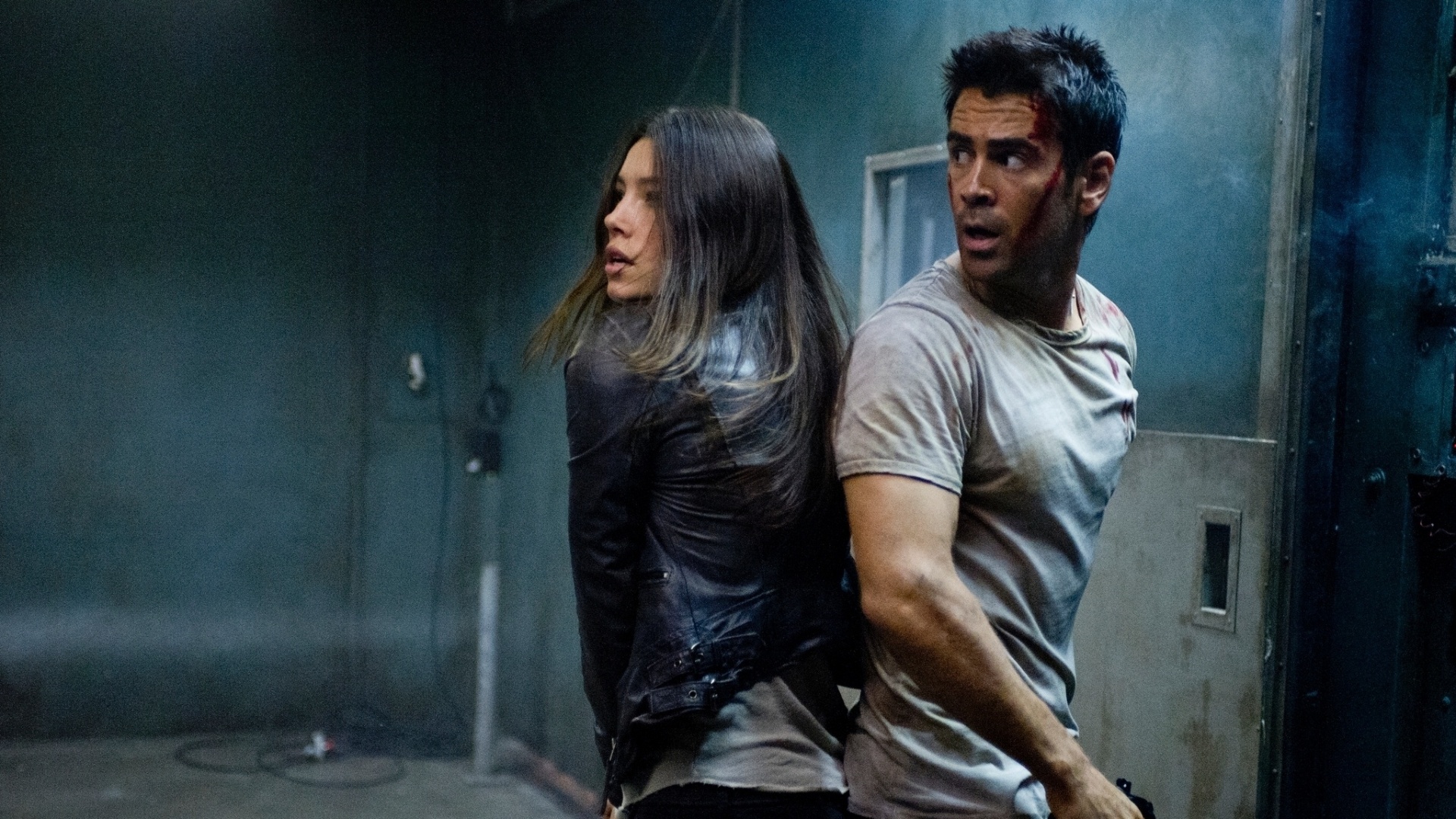 Colin Farrell e a atriz Jessica Biel em cena do filme "O Vingador do Futuro" (2012) - Divulgação