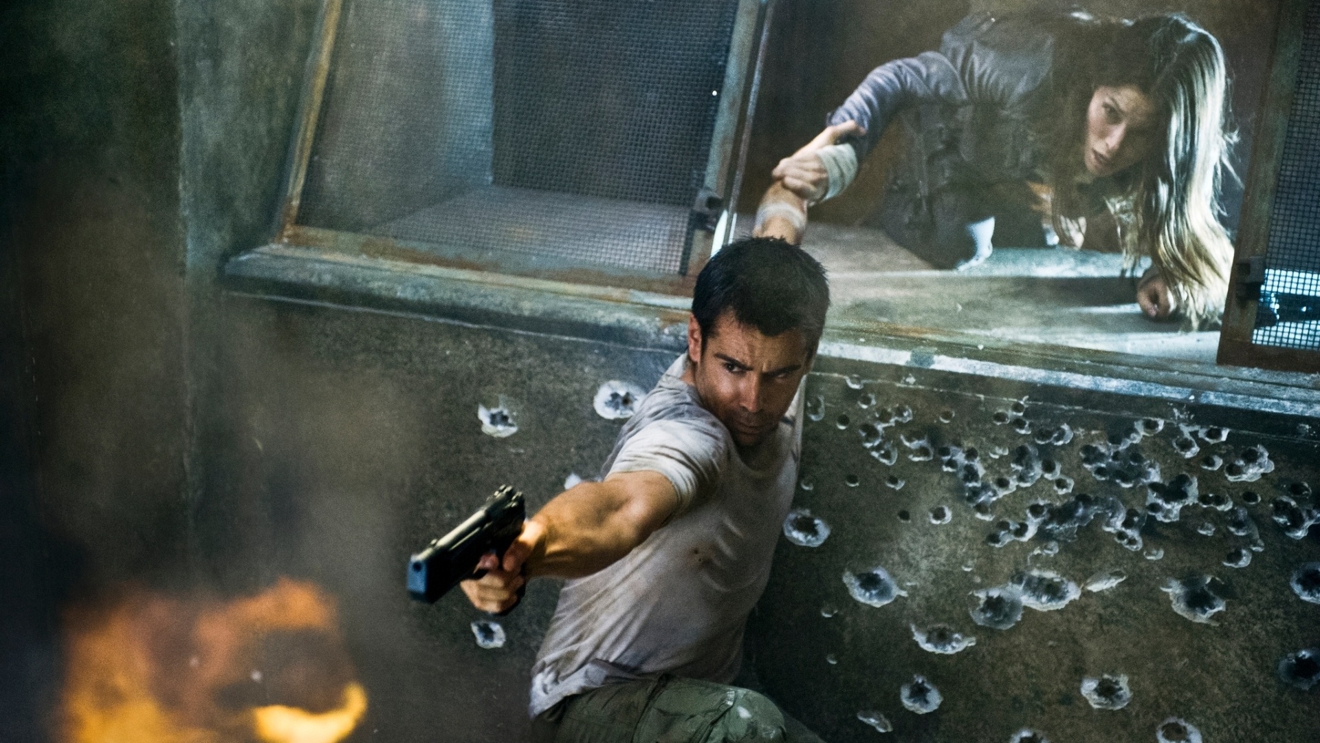 Colin Farrell e a atriz Kate Beckinsale em cena do filme "O Vingador do Futuro" (2012) - Divulgação