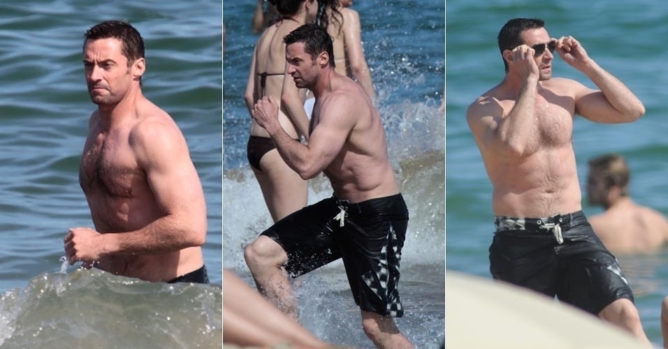 Hugh Jackman deixa músculos à mostra durante banho de mar em Barcelona (20/6/12)