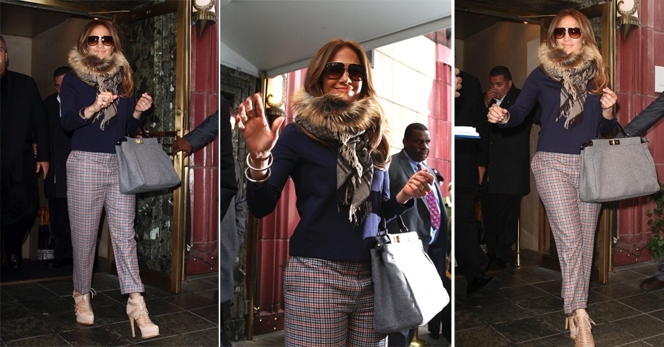 A cantora, atriz e apresentadora do programa norte-americano "American Idol" Jennifer Lopez, é conhecida por um estilo sexy. Porém, no dia a dia ela não costuma mostrar o corpo e gosta de investir em peças elegantes. Sem nunca deixar as texturas de lado em seus looks, Jennifer Lopez foi fotografada saindo de um hotel em Nova York usando calça xadrez, blusa de tricô, estola de pele, sapatos com detalhes e amarrações e bolsa básica cinza  - Brainpix