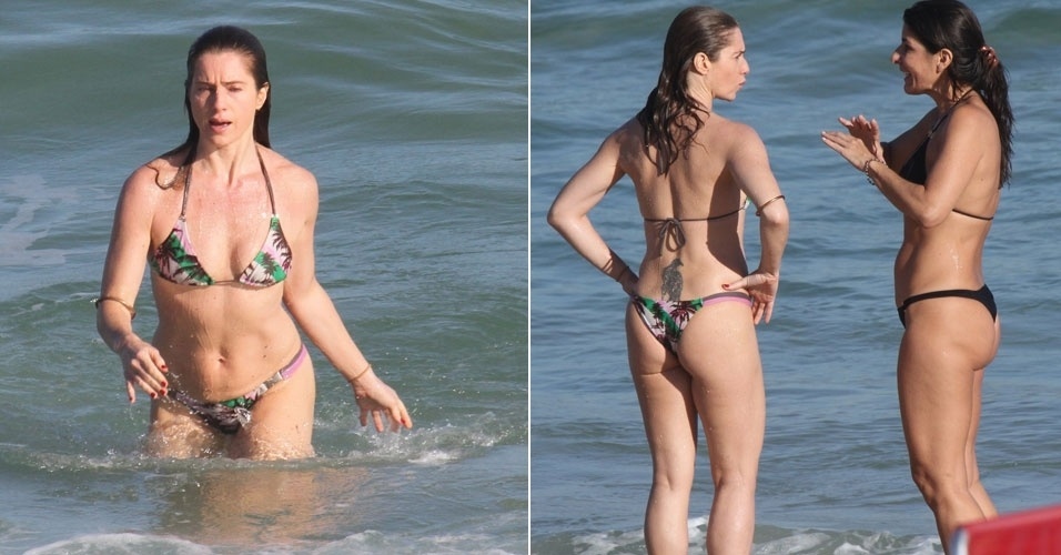 Leticia Spiller toma banho de mar com biquíni pequeno no Rio de Janeiro