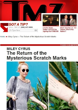 A cantora Miley Cyrus, que voltou a apresentar marcas de arranhões no pulso