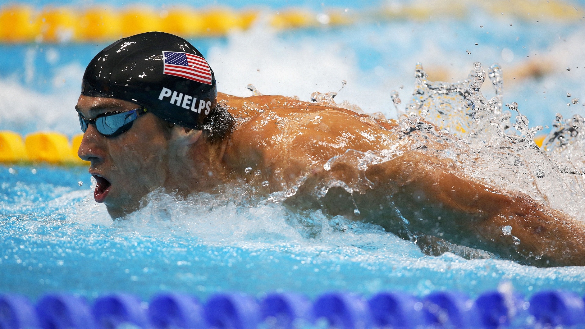 Norte-americano Michael Phelps nada para vencer a segunda semifinal dos 200 m borboleta (30/07/2012)