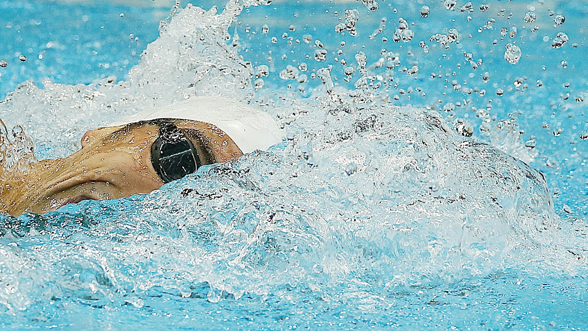Phelps liderou boa parte da sua bateria dos 200 m medley e terminou em segundo lugar com o tempo de 1min58s24