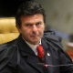 2.ago.2012 - O ministro Luiz Fux, um dos 11 ministros do Supremo que votarão no caso do mensalão, participa da sessão, nesta quinta-feira (2). Os ministros votaram pelo indeferimento do pedido inicial dos advogados, que queriam o desmembramento do processo, para que os réus respondessem pelos crimes separadamente - Roberto Jayme/UOL