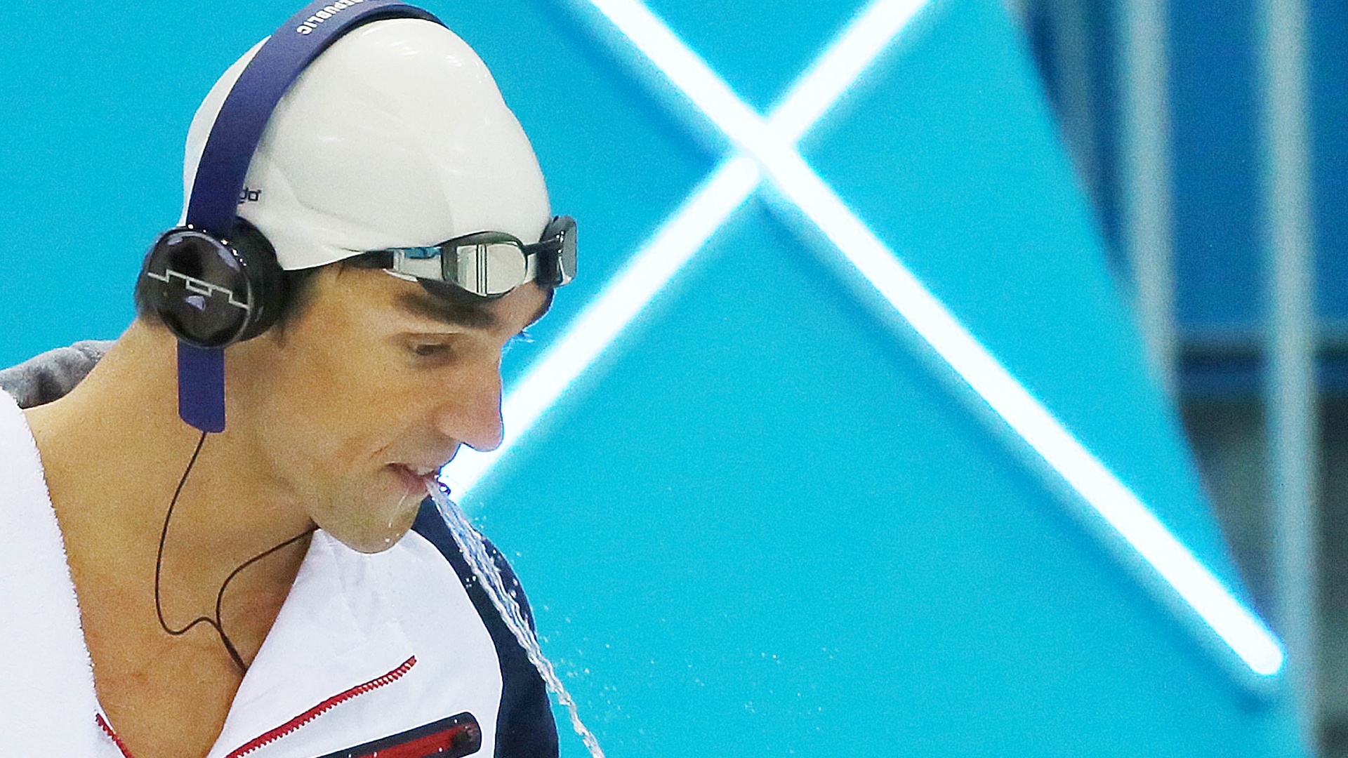 Michael Phelps se prepara para eliminatória dos 100 m borboleta