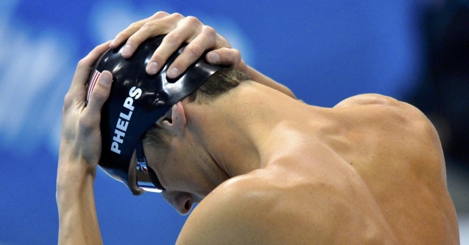 Michael Phelps se prepara para nadar as semifinais dos 100 m borboleta (02/08/2012)