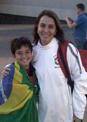 Patrícia Amorim com o filho após assistir evento no Parque Aquático de Londres
