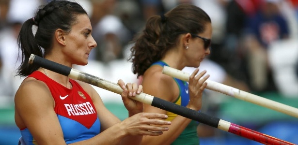 Yelena Isinbayeva e Fabiana Murer se concentram nas eliminatórias do salto com vara