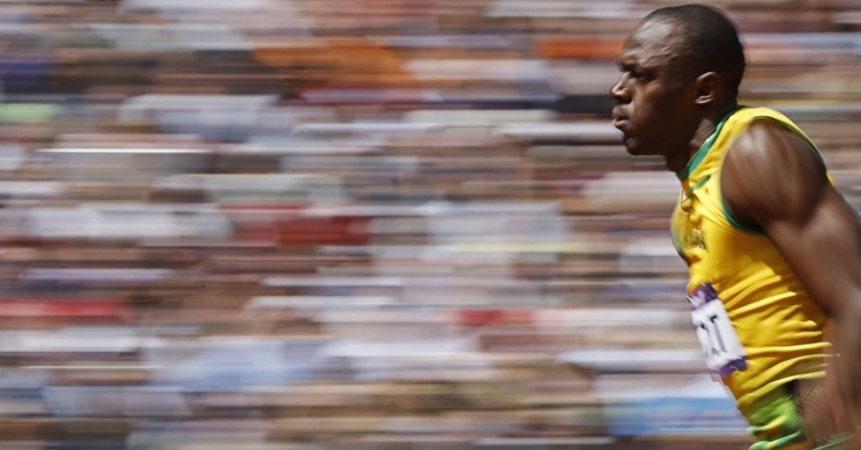 Usain Bolt venceu sua bateria nas eliminatórias dos 100 m rasos e foi à final em nono lugar