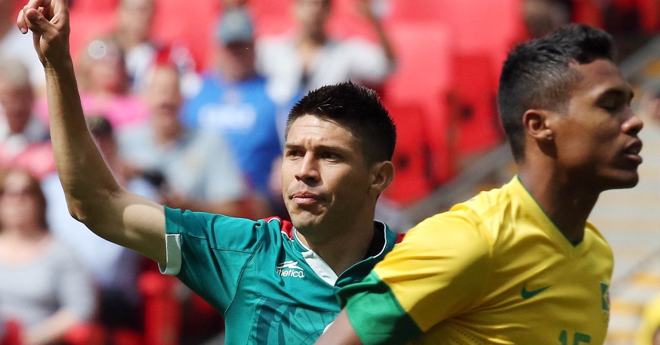 Mexicano Peralta comemora após abrir o placar contra o Brasil com menos de um minuto de jogo