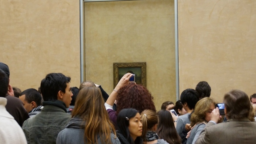 A Mona Lisa, no museu do Louvre em Paris, é uma das obras mais visitadas e fotografadas - Nelson Garcia Perandréa