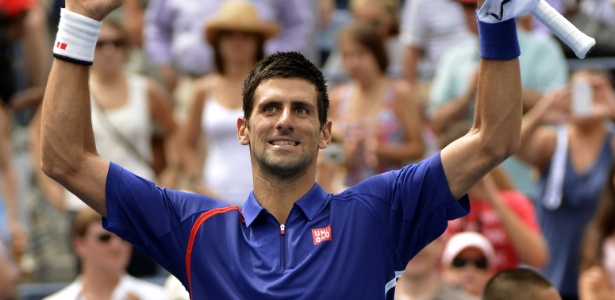 Com "barba por fazer", Novak Djokovic comemora vitória sobre Julien Benneteau - AFP PHOTO / TIMOTHY A. CLARY