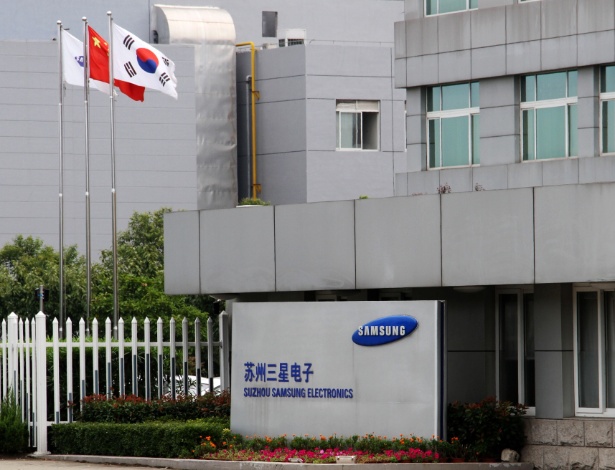 Fachada da fábrica de Suzhou (na China),da Samsung; funcionários são submetidos a longas jornadas de trabalho, segundo relatório publicado pela entidade China Labor Watch - AFP