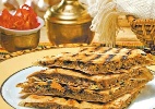 Sanduíche com pão sírio ganha versões incrementadas e doces em lanchonete - Divulgação 