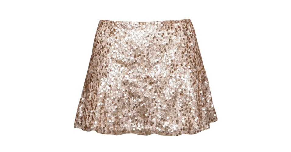A saia cinza brilhante usada por Cida (Isabelle Drummond), em "Cheias de Charme", não está mais a venda, mas é possível se inspirar no estilo e apostar em uma saia curtinha com brilho, como esta da Afghan, que custa R$ 189 (www.afghan.com.br). Preço pesquisado em setembro de 2012 e sujeito a alterações - Divulgação