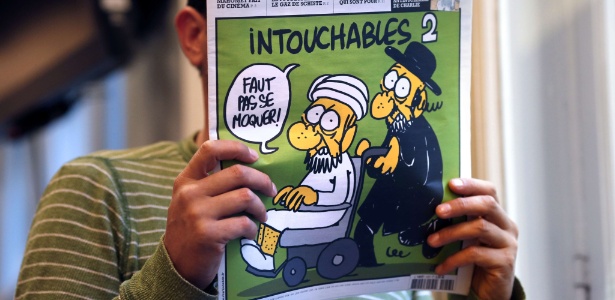 Capa da revista francesa "Charlie Hebdo", que traz cartuns satirizando Maomé - Thomas Coex/AFP