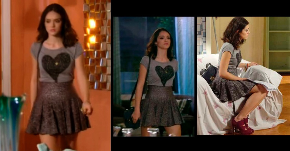 O look de saia cinza, camiseta com estampa de coração e pingente usado por Cida (Isabelle Drummond), em "Cheias de Charme", foi o mais pedido na Central de Atendimento ao Telespectador da Globo em agosto. A saia cinza brilhante liderou a lista, ela é da Coven, mas por ser de uma coleção passada, não está à venda. A camiseta entrou em quinto lugar, já o pingente de coração, ficou em sétimo lugar na lista de acessórios mais pedidos - Reprodução TV Globo