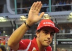 Com 3º em Cingapura, Fernando Alonso supera número de pódios de Ayrton Senna - AFP PHOTO / Punit PARANJPE