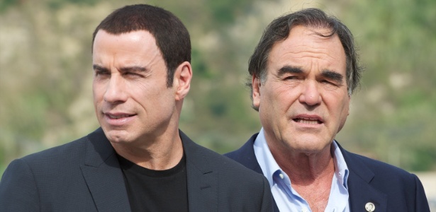 John Travolta e Oliver Stone na sessão de fotos do filme "Selvagens" no Festival de San Sebastian (23/9/12) - Carlos Alvarez/Getty Images