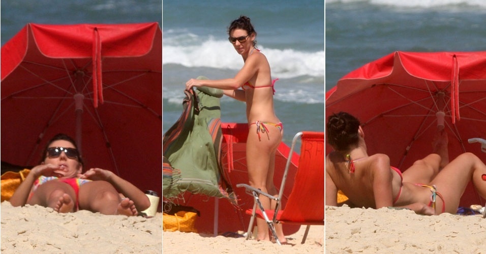 A apresentadora Glenda Kozlowski exibe boa forma ao tomar banho de sol na praia de Ipanema, no Rio de Janeiro (4/10/12)
