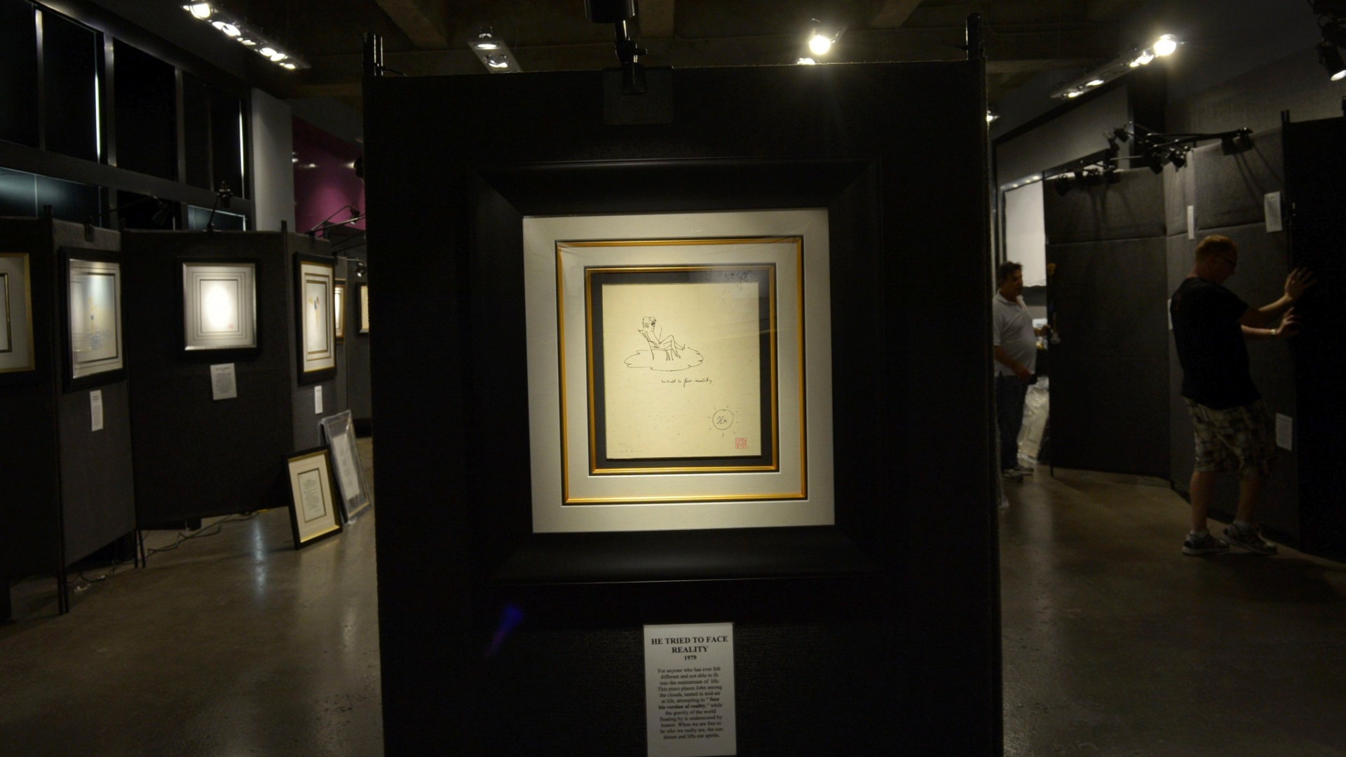 Desenhos de John Lennon da exposição "A Arte de John Lennon" em galeria de arte no Soho, em Nova York (4/10/12) - EFE/Justin Lane