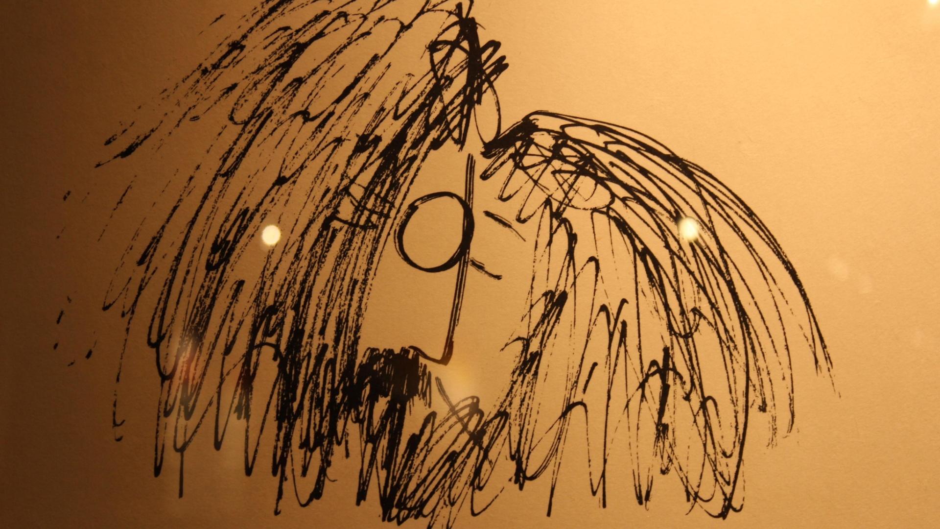 Detalhe de um dos desenhos de John Lennon em exposição em galeria no Soho, em Nova York (4/10/12) - EFE/Jessica Martorell