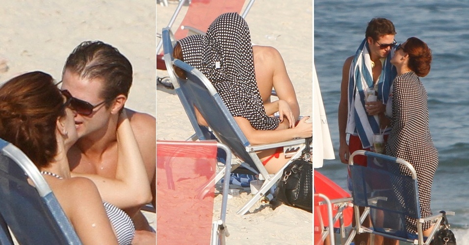 Flagrada aos beijos com um rapaz, a atriz Mayana Neiva usa uma canga para se enconder dos fotógrafos. A atriz passou a manhã na praia de Ipanema com seu acompanhante e retornou para observar o por do sol à tarde (10/10/12)