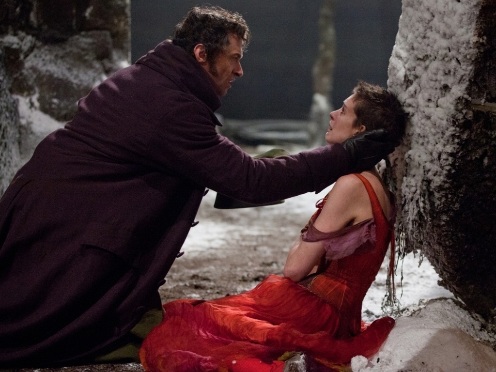 Hugh Jackman e Anne Hathaway em cena de "Os Miseráveis", de Tom Hooper - Divulgação