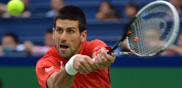 Djokovic ainda não perdeu sets no torneio e vem de nove vitórias seguidas - AFP PHOTO /Mark RALSTON