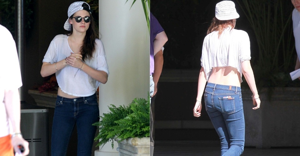 Kristen Stewert chega a hotel em Beverly Hills usando uma camiseta que deixava à mostra parte de suas costas (30/10/12)