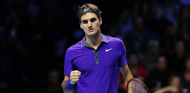 Federer comemora ponto sobre Tipsarevic em sua estreia nas Finais da ATP - Glyn Kirk/AFP