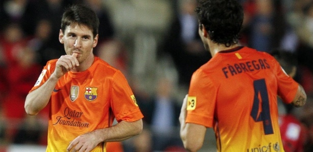 Lionel Messi comemora com Fábregas depois de marcar um dos gols contra o Mallorca - Enrique Calvo/REUTERS